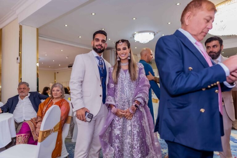 Bride and groom with guests during their wedding ceremony