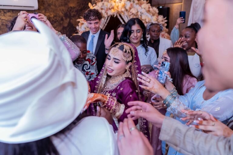 Guests gathered around the bride during a wedding ritual